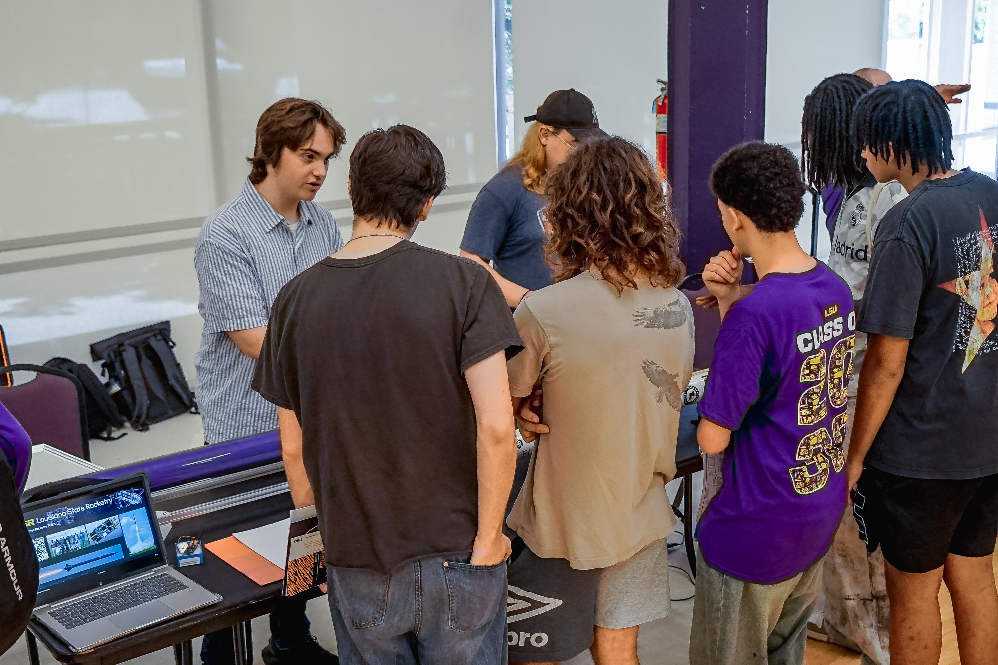 Visitors gathered at the LSR booth